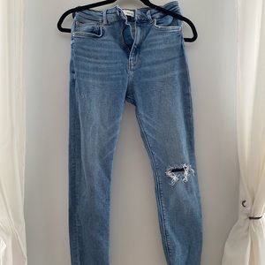 ZARA light wash high rise skinny jeans with ripped knee
